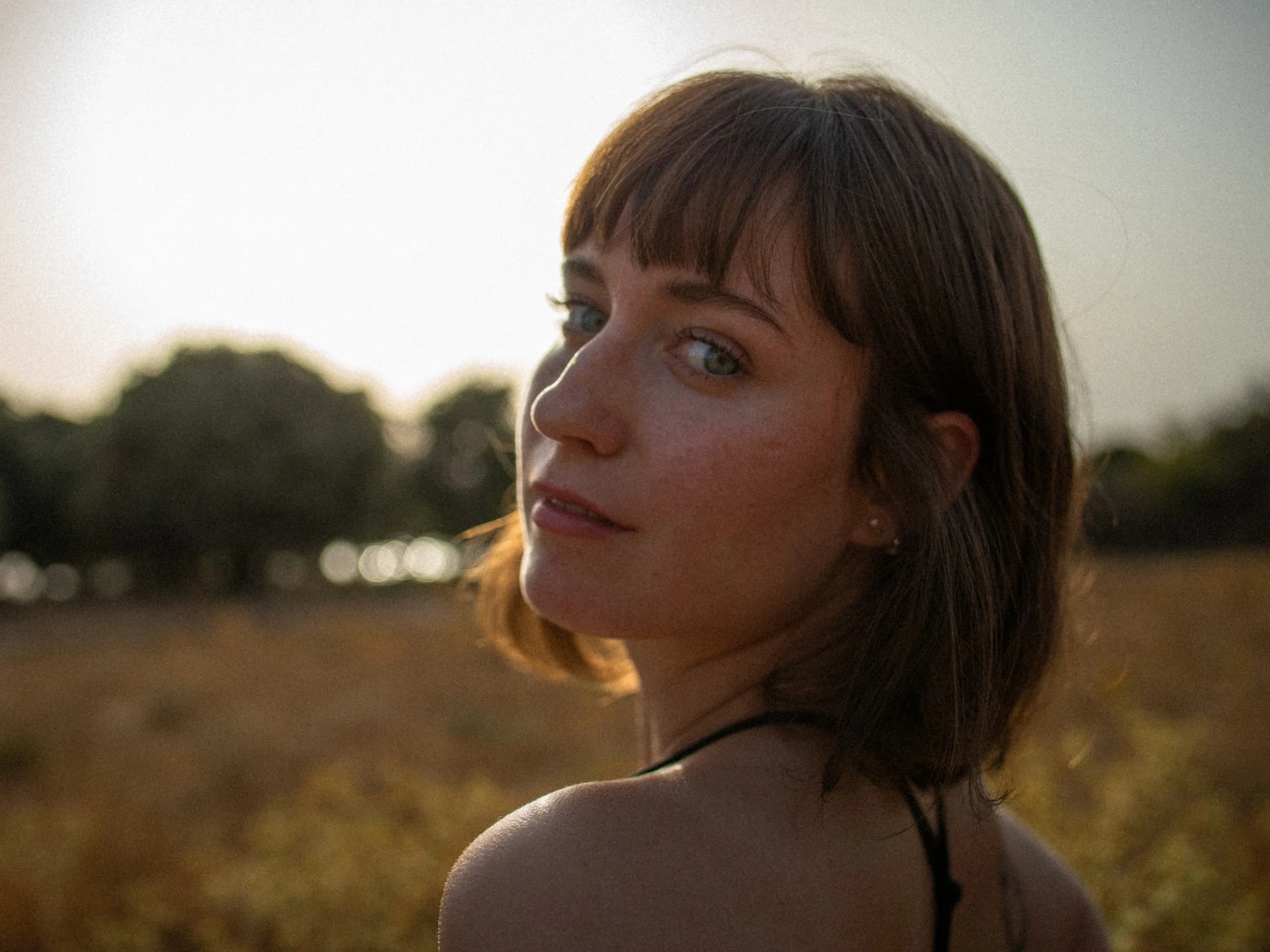 portrait of a woman in soft, warm lighting